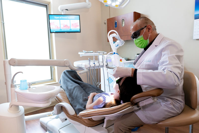 Doctor checking Patients mouth