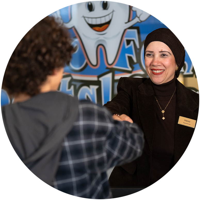 Team member shaking patient's hand