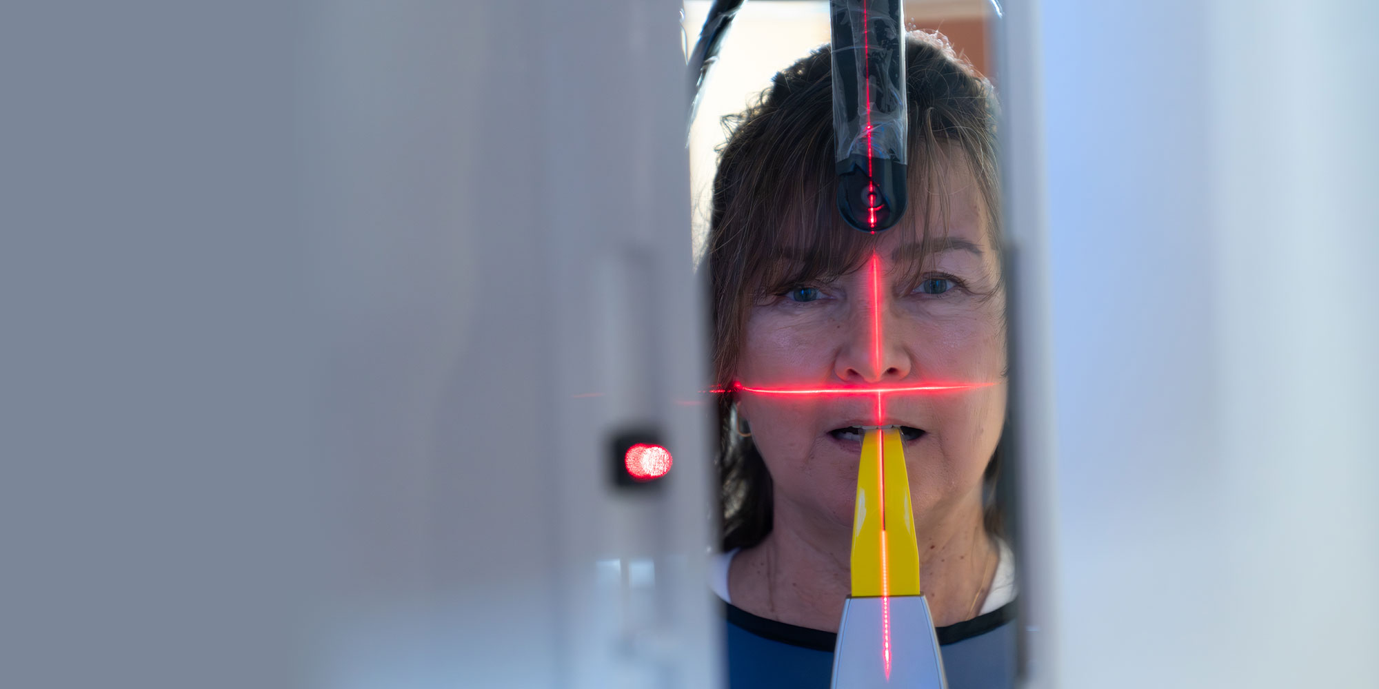 Patient taking a dental X-Ray