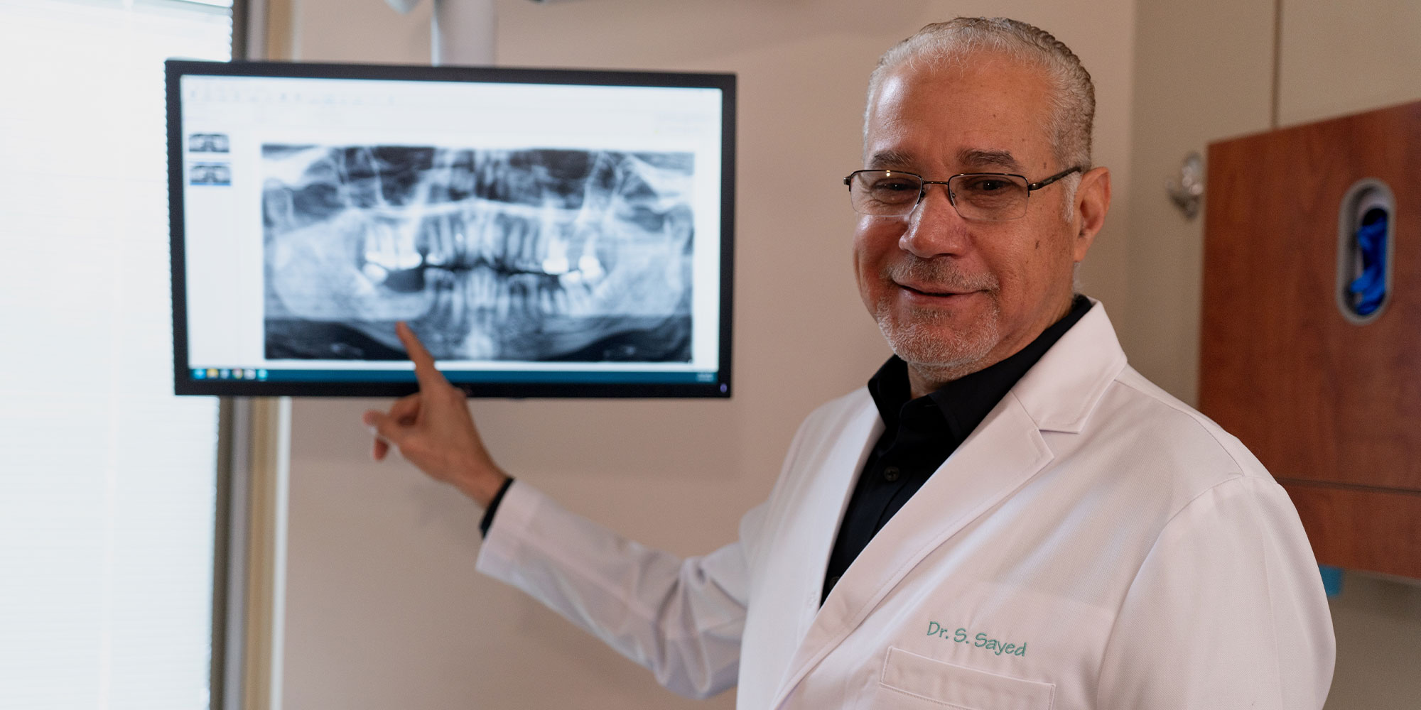 Doctor pointing at Dental X-ray